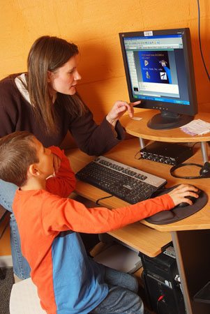 CA student and parent learning coach at computer