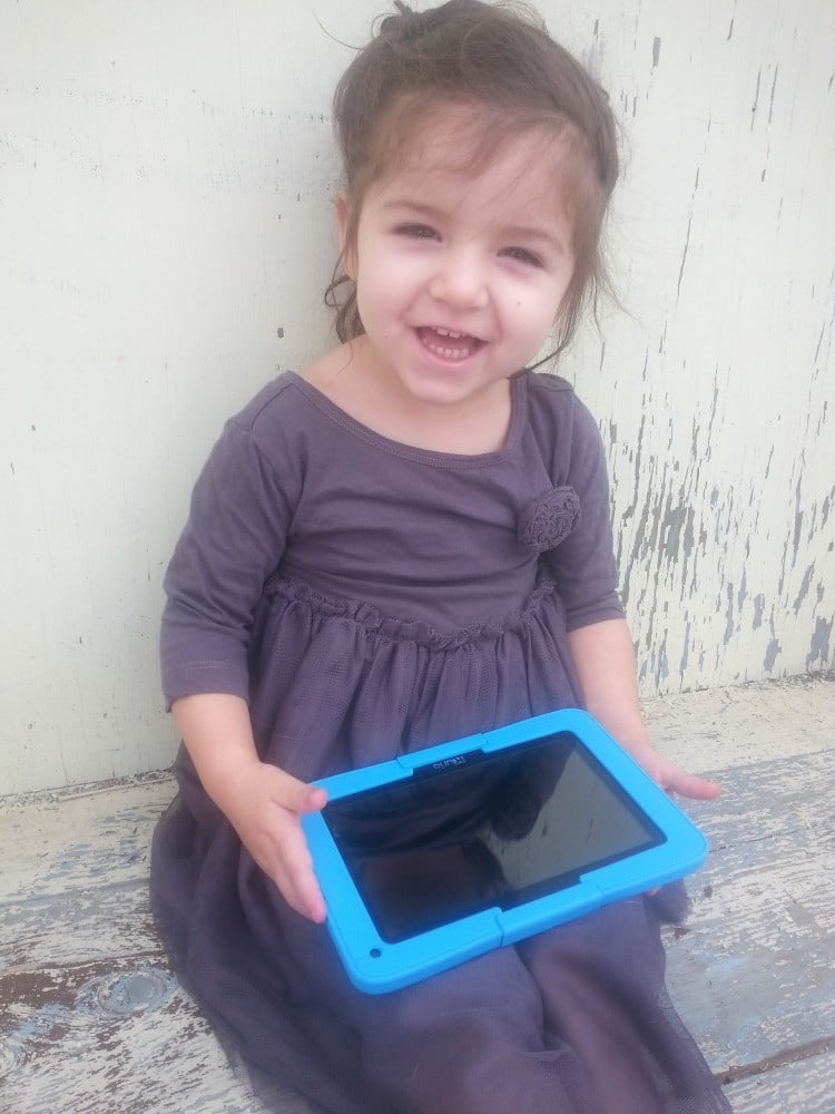 Child ready for a tablet