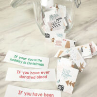Musical Chairs Christmas Gift Exchange game - use this fun game to mix up your party and swap seats if the question applies to you then you stand up and try to find a different chair. A great way to get to know you with a church group or classroom setting or just fun for families and workplaces! Includes free printable gift exchange game question strips.