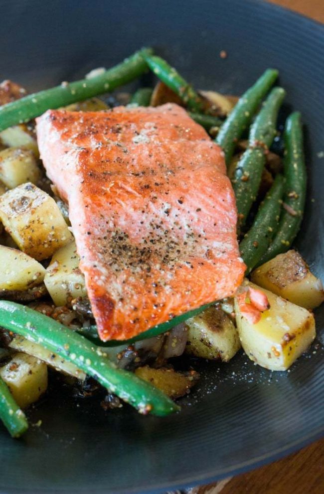 Chef inspired Steakhouse salmon recipe is going to take up your cooking to the next notch! We used this recipe for a fun cooking date night at home for just the two of us. Sharing tips on how to recreate the dish and your own at home date night with your sweetheart or add another couple for a group date!