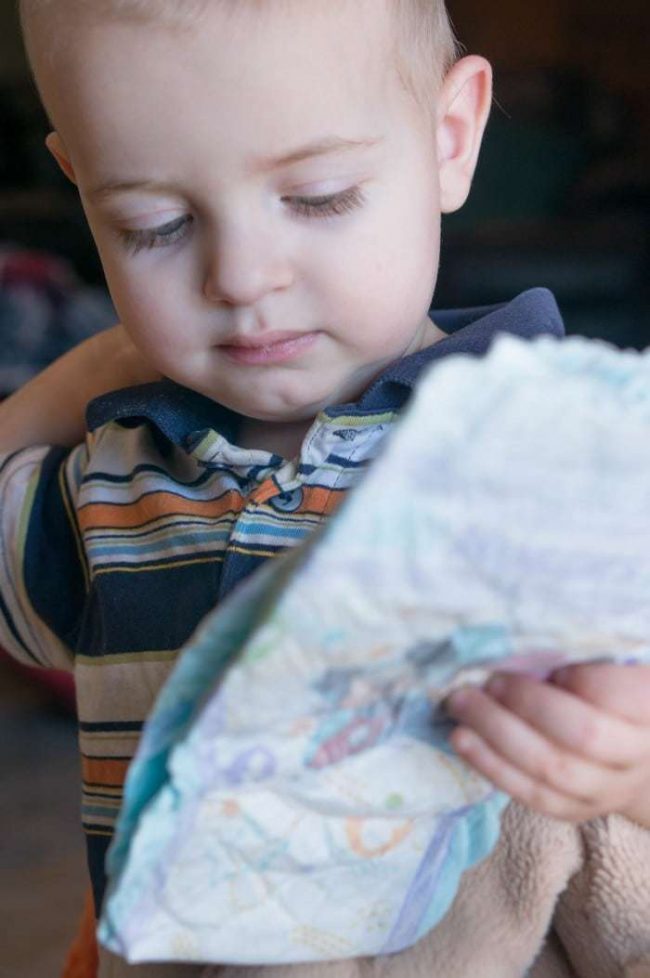 Tips, tricks and hacks that will help you through diapering your toddler! Once they're able to crawl (or run) away - they'll take the opportunity! This tips can help you tackle your diaper duty and have your child help!