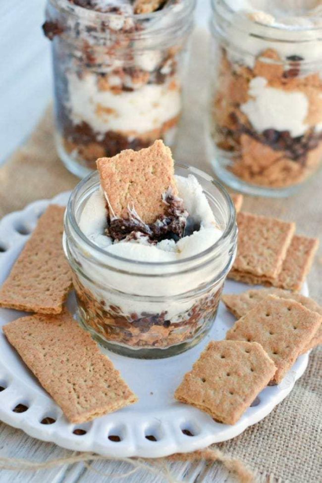 Oh. my. these taste like SUMMER! These mason jar s'mores were so easy to make, too, just a few mins prep and bake for about 10 minutes and you're ready to go! Loved every bite of chocolate and marshmallow goodness in this diy s'mores recipe you bake at home!