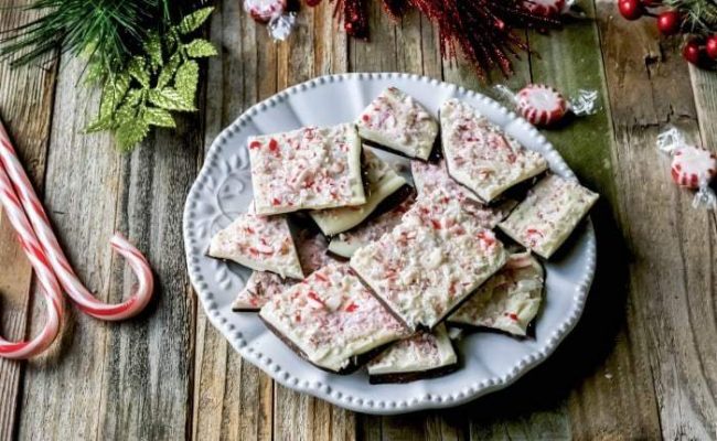 This Dark Chocolate Peppermint Bark is quickly going to become a holiday favorite recipe! It's so easy and yummy and just feels like Christmas!