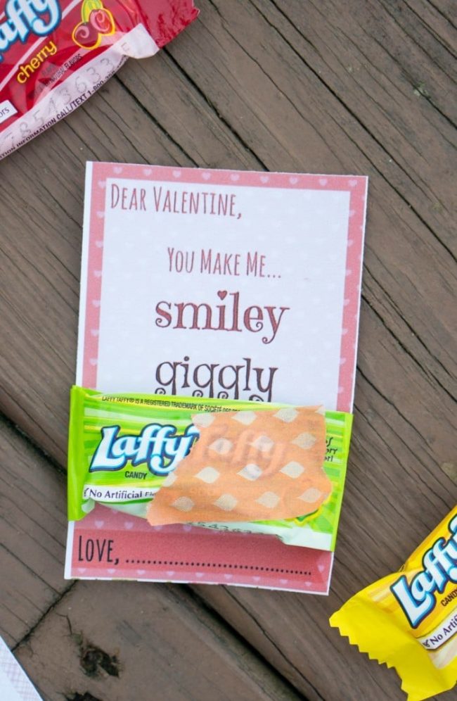 Absolutely darling "You Make Me Laffy" free printable valentines day cards perfect for kids, friends, classrooms. Attach a laffy taffy candy and you're done! So quick, easy, and cheap!