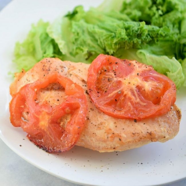 So much flavor in this easy roasted tomato Italian chicken recipe it will become a favorite dinner dish. Tomatoes flavor this chicken to perfection in under 30 minutes.