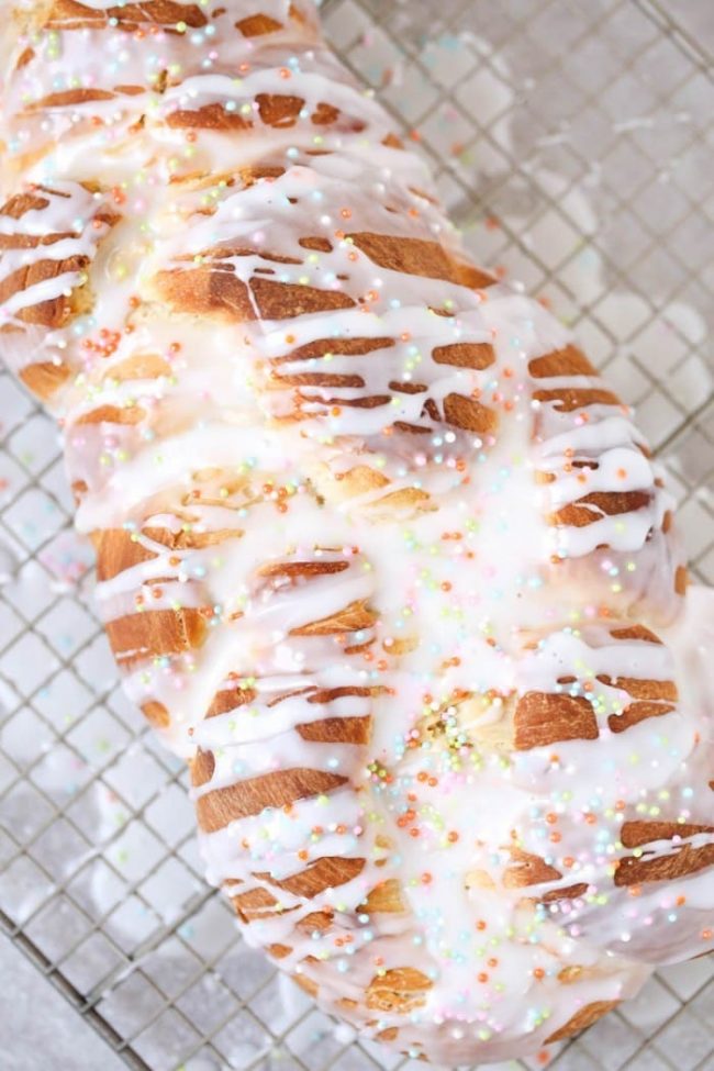 The sweet glazed topping and touch of sprinkles will make this delicious Easter bread a huge hit with your gathering. A perfect Easter side dish recipe.