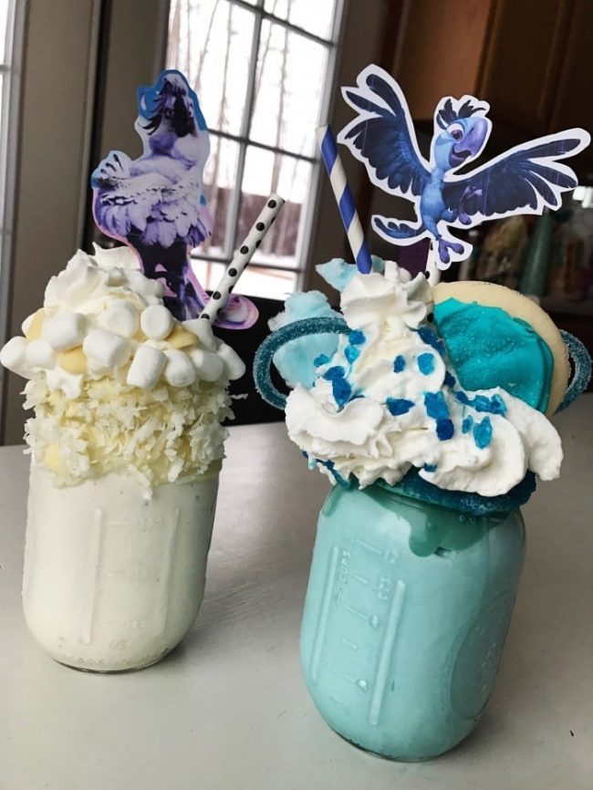 RIO MIlkshakes! These premium milkshake creations are a big hit with the whole family. Perfect family movie night dessert or treat to share. Load up the milkshakes with coconut, marshmallows, sugar cookies, or other goodies.