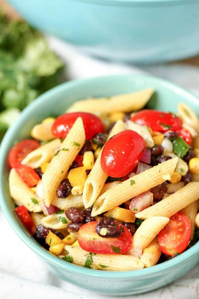 All the flavor of Texas and Mexico in one exciting, flavorful pasta salad! This Tex-Mex salad is a crowd pleaser. Homemade dressing and loaded with veggies.