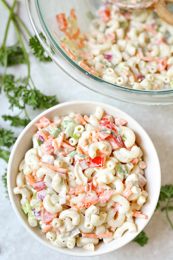 This flavorful macaroni salad is the best we've ever tried! So easy to make and perfect for picnics and barbecues. Perfect side dish recipes for summer.