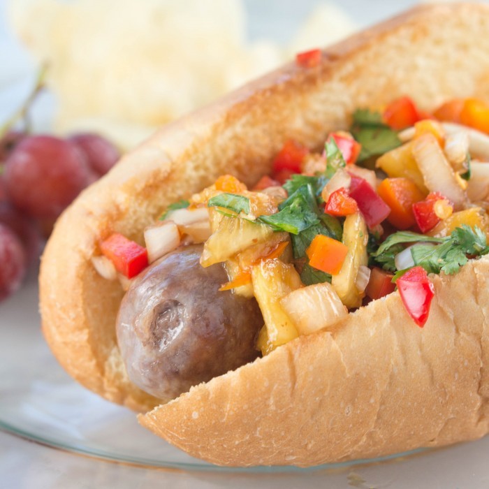 pineapple pico de gallo on bratwursts