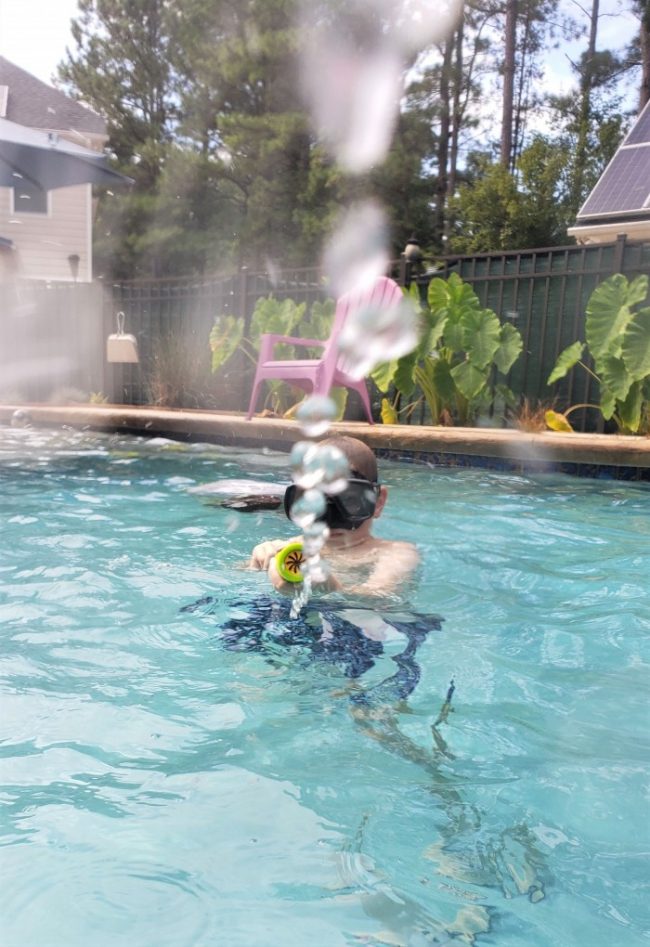Pool Day Packing List & Tips 11 Pool Day Packing List & Tips water gun on phone